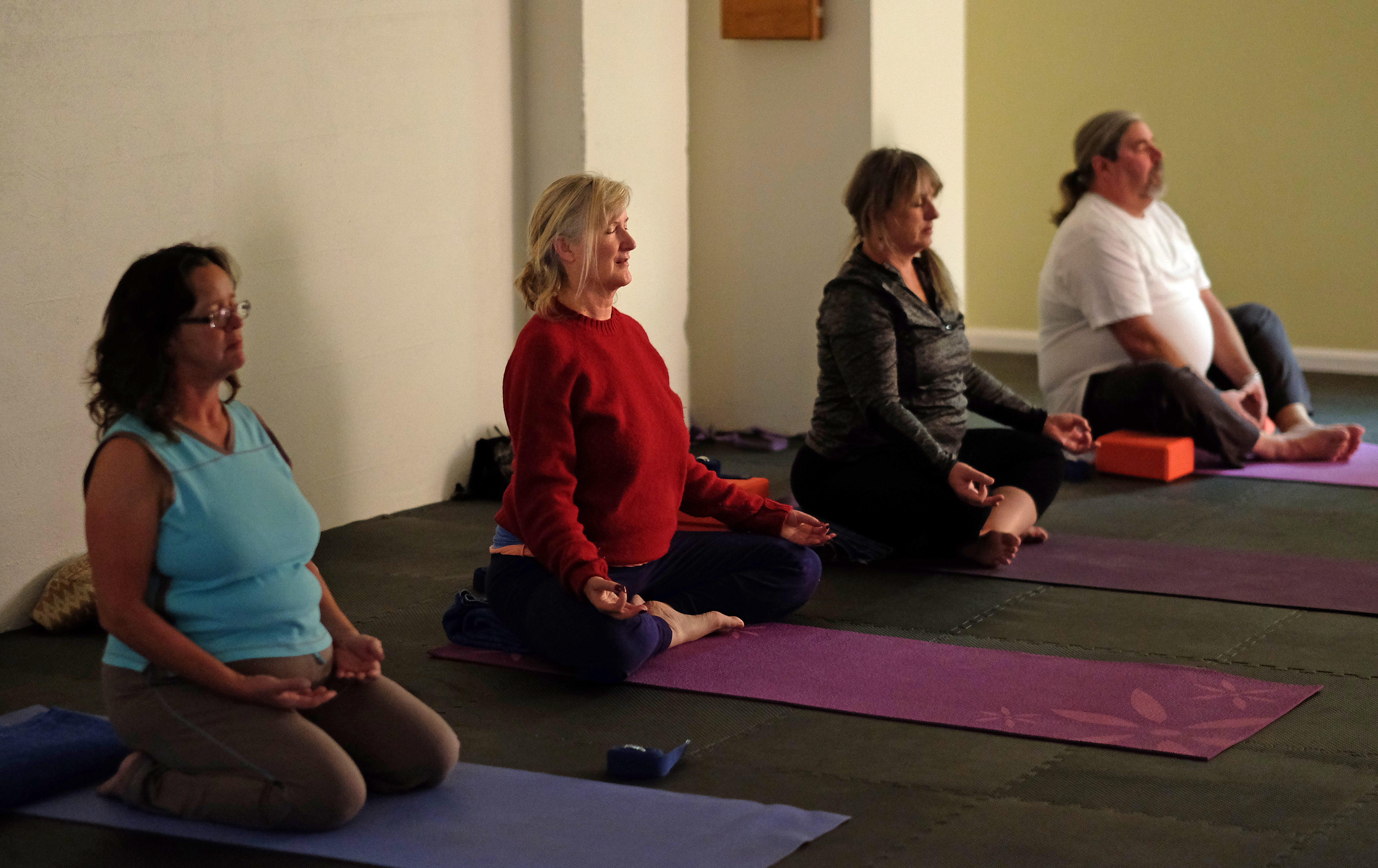 A community yoga class at Birdseed Yoga, Waynesboro, Va. Wednesday Nov. 23, 2016. (Photo by Norm Shafer).