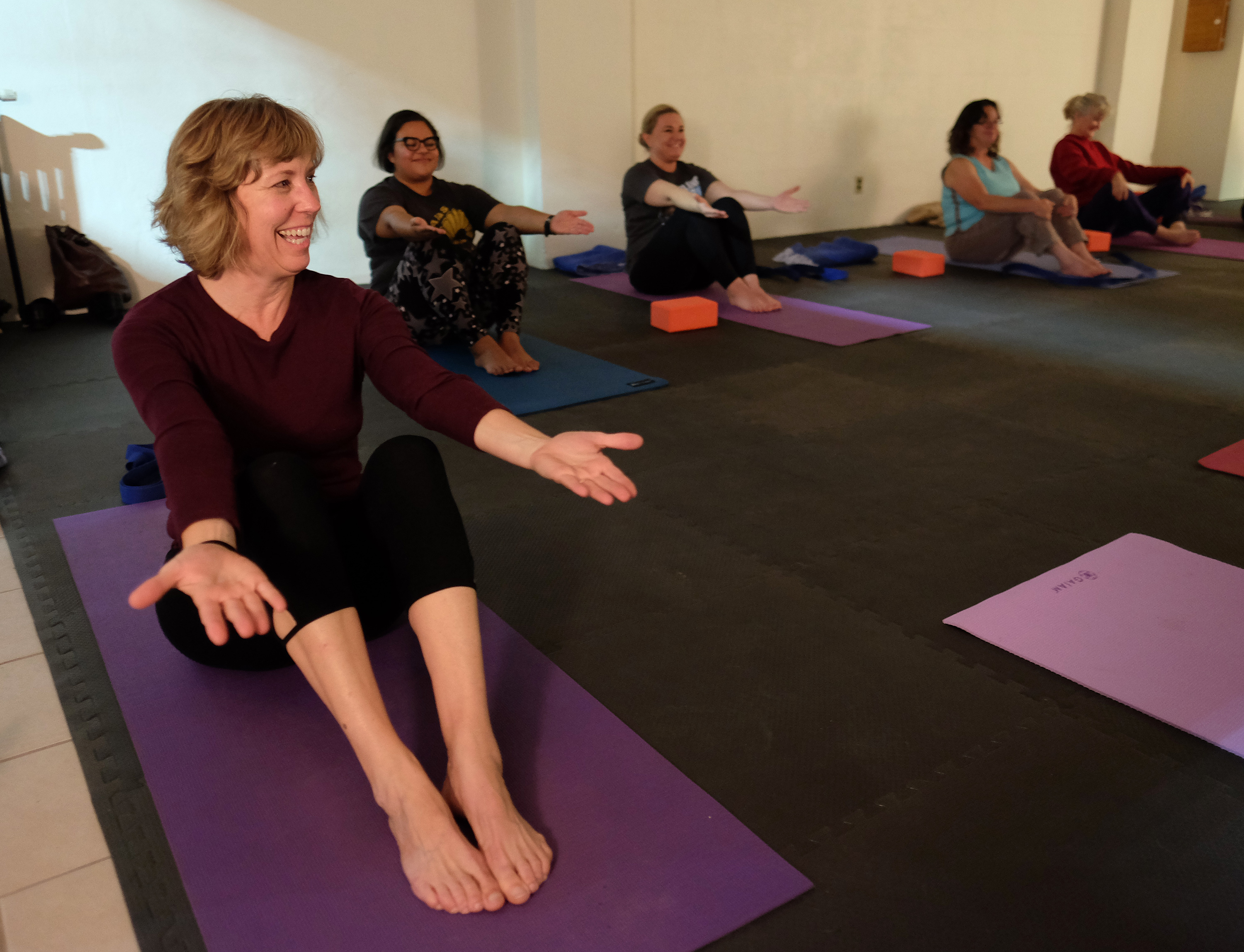 Paula Figgatt teaches a community yoga class at Birdseed Yoga, Waynesboro, Va. Wednesday Nov. 23, 2016. (Photo by Norm Shafer).
