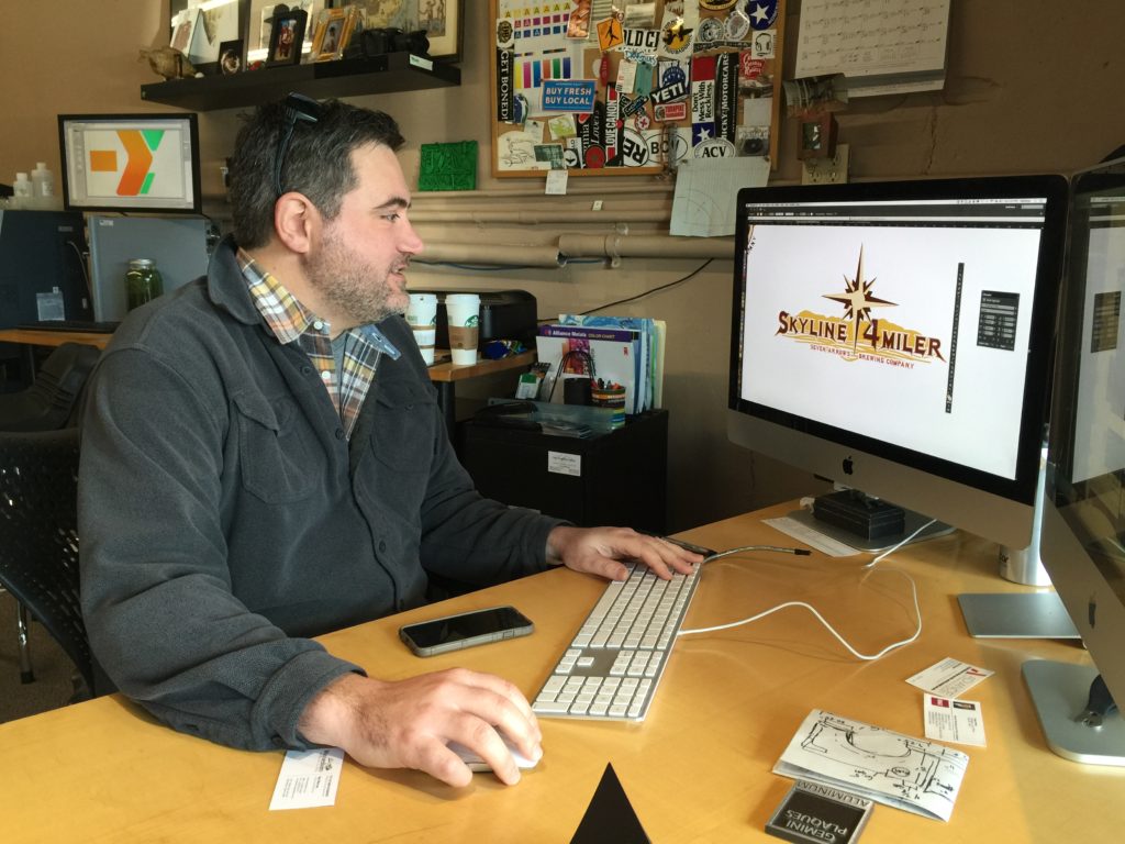Local Graphic Designer Holding the Key – Grow Waynesboro